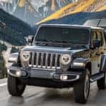 2019 Jeep Wrangler towing a boat