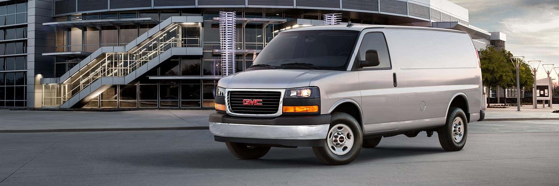 2025 gmc savana parked in front of building