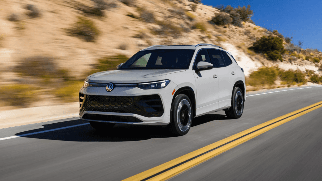 2026 Volkswagen Tiguan driving through highway showing performance and stability