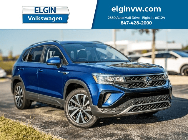 Used Volkswagen Taos compact SUV parked outside Elgin VW dealership