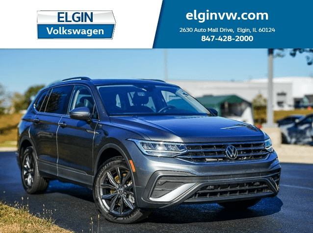 Used Volkswagen Tiguan SUV parked outside Elgin VW dealership