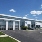 Exterior of Elgin Volkswagen dealership with vehicles