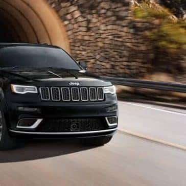 2019 Jeep Grand Cherokee driving out of tunnel