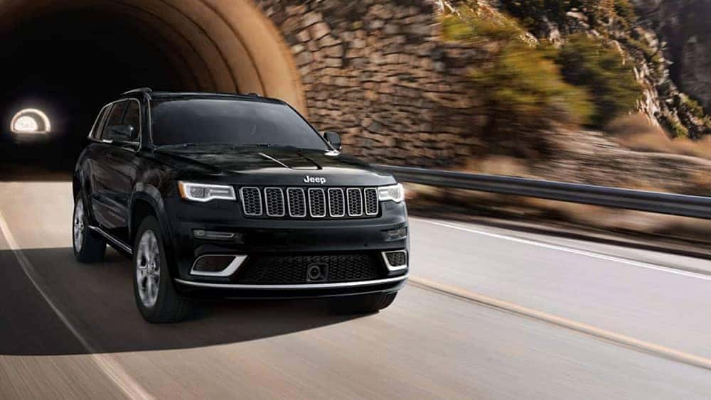 2019 Jeep Grand Cherokee driving out of tunnel