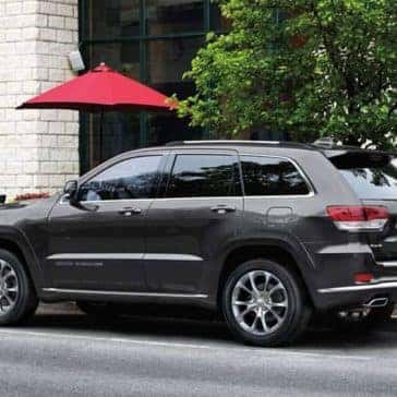 2019 Jeep Grand Cherokee near umbrella
