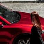 Couple walking towards red 2019 Mazda CX-5
