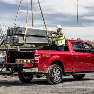 Machine Loading Heavy Objects in Bed of 2019 Ford F-150