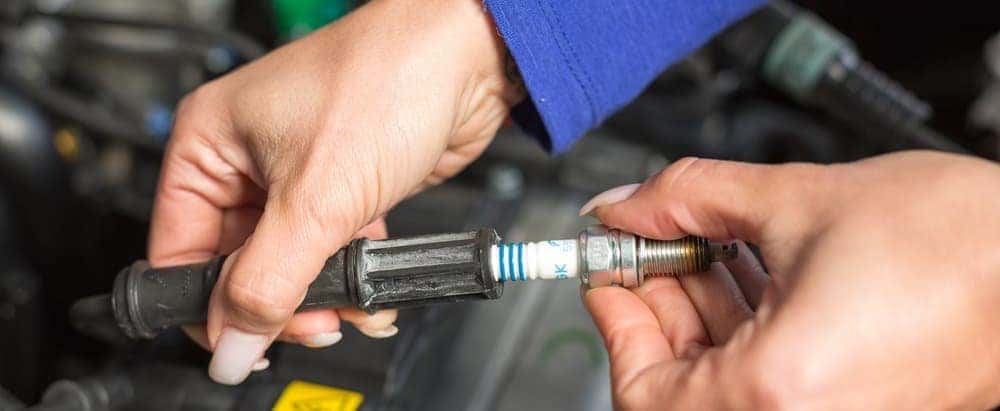 bad spark plug symptoms check engine light flashing