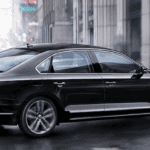 2019 Volkswagen Passat in Black on the Road