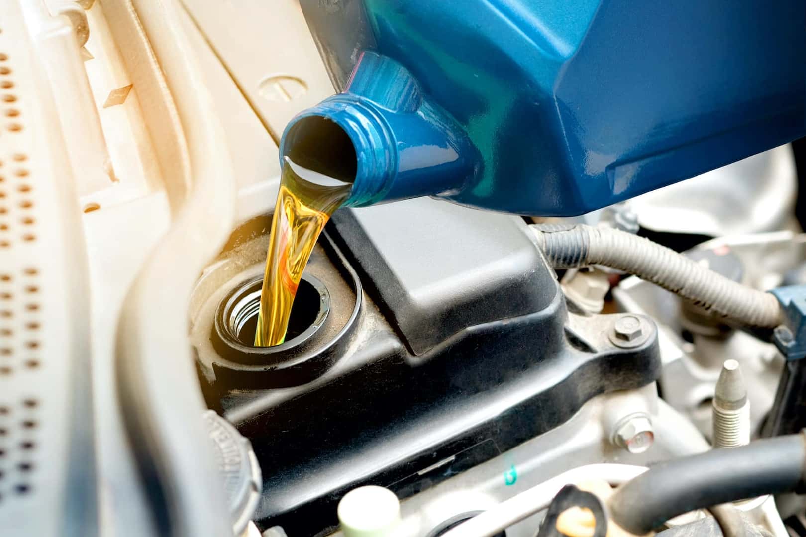 Oil Pouring into Car