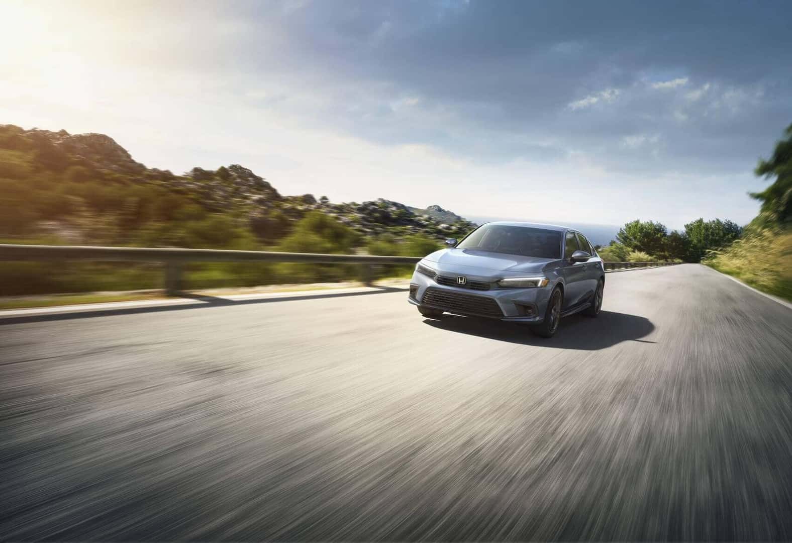 The Civic cruises down the highway