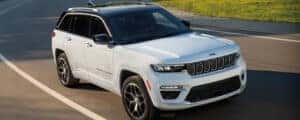 2025 jeep grand cherokee driving on road