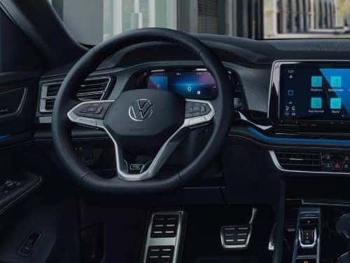 2024 Volkswagen Atlas Cross Sport view of dash and steering wheel