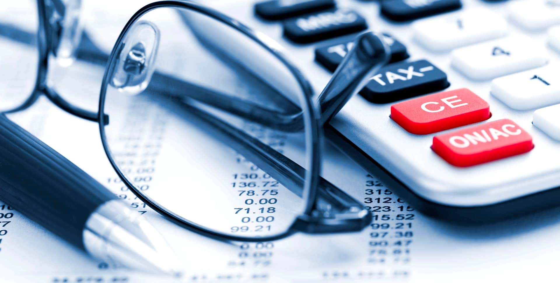 finance paperwork with glasses