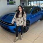 Allye Standing In Front of 2026 Dodge Charger