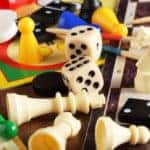 Board games, pawns, chessmen, dominoes and dices.