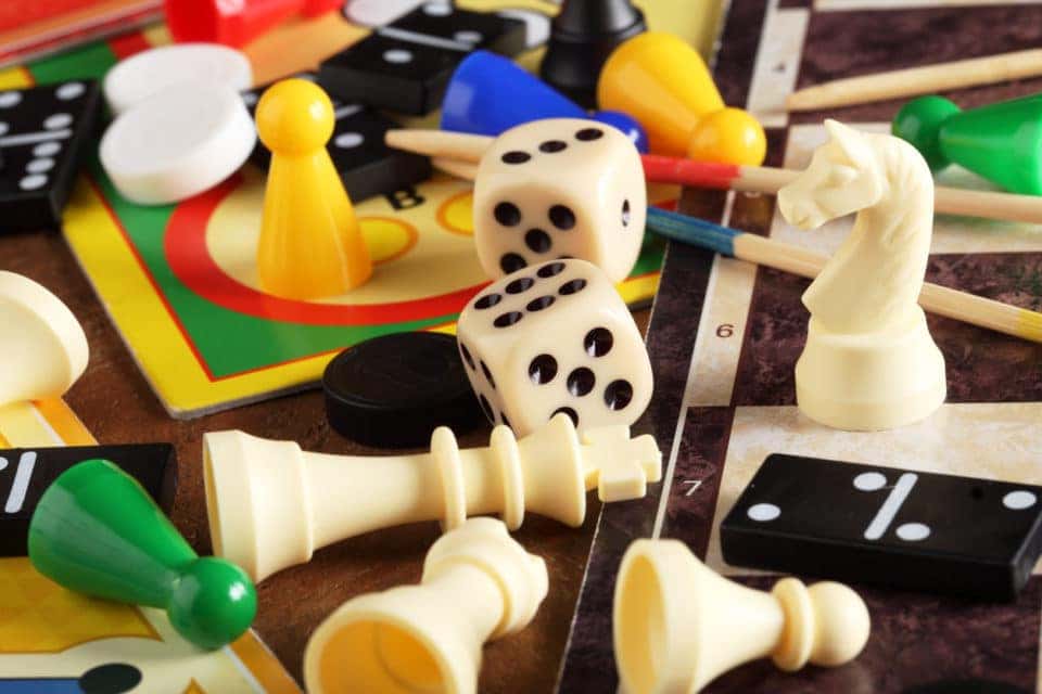 Board games, pawns, chessmen, dominoes and dices.