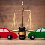 toy cars with a scale and gavel