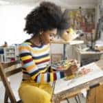 Woman painting in an art studio