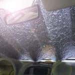 Aluminum coverlet on the windshield of the car to protect from heat and sun inside.