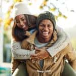 Portrait of a young attractive couple in a public park outside