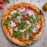 Pizza with Parma ham and arugula