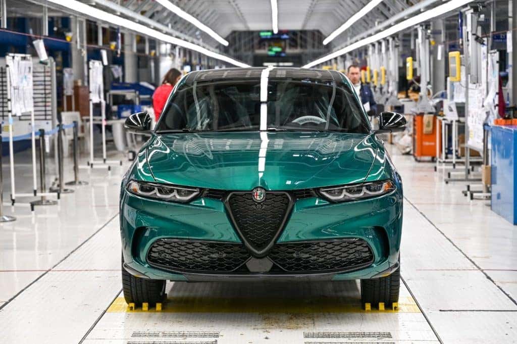 A green Alfa Romeo Tonale in the assembly line