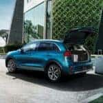 blue kia niro with rear door open