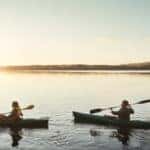 Family canoeing on the lake