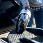cleaning car interior with portable vacuum cleaner