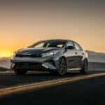 2024 KIA Forte GT Cruising on the highway