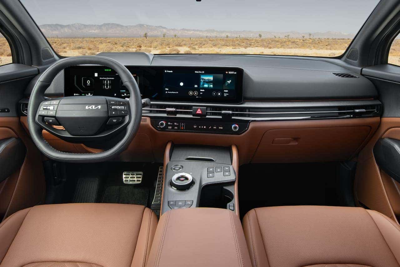 The cargo area of a 2025 KIA Sportage, showcasing its spacious interior and sleek design features for optimal storage.