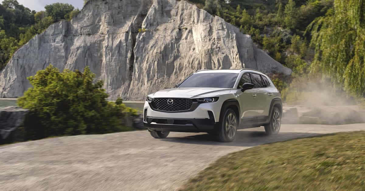 2026 Mazda CX-50 Hybrid driving mountainside