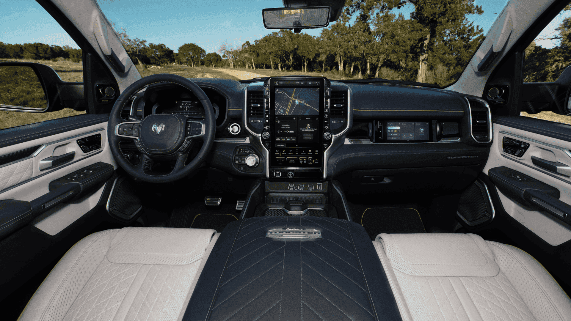 Interior of 2025 Ram 1500 showing front seats and digital dashboard display
