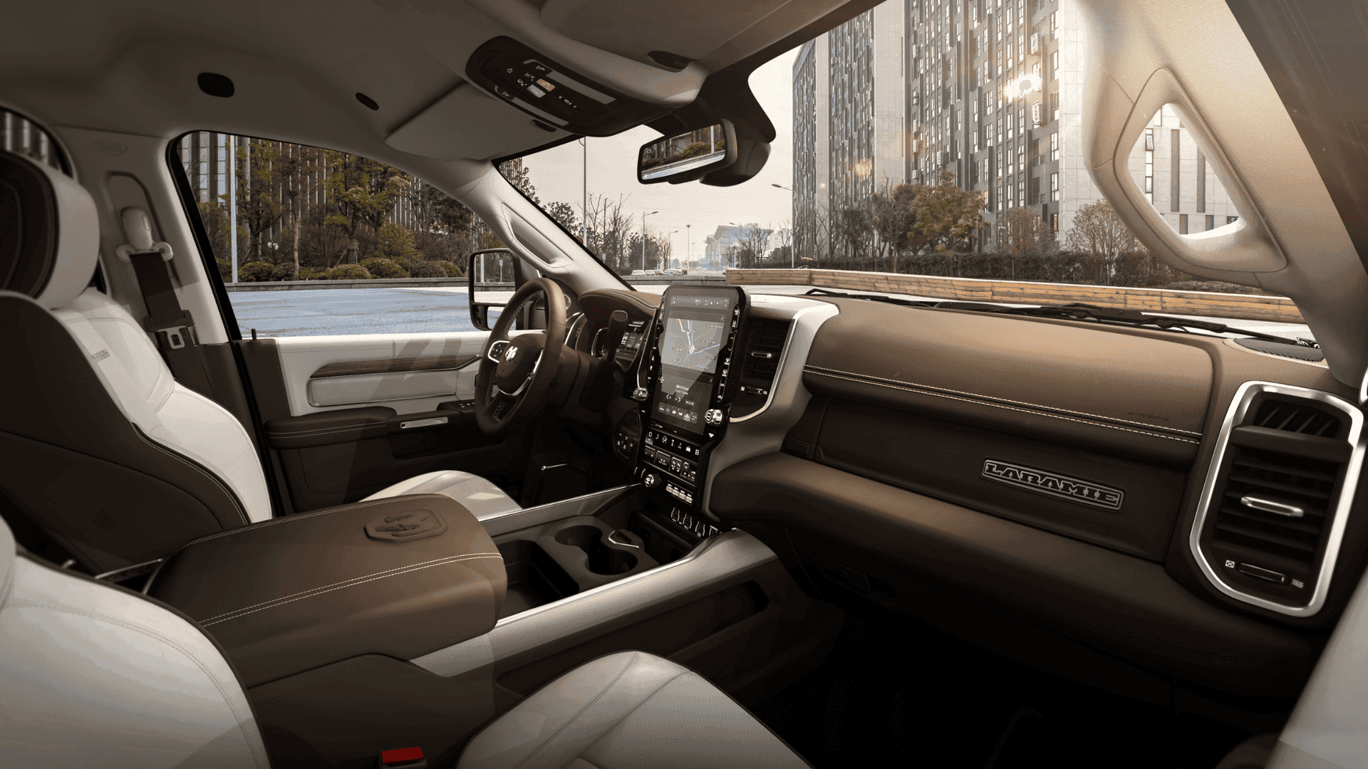 Two-tone interior of 2025 Ram 3500 Laramie with leather seats and wood-accented dashboard