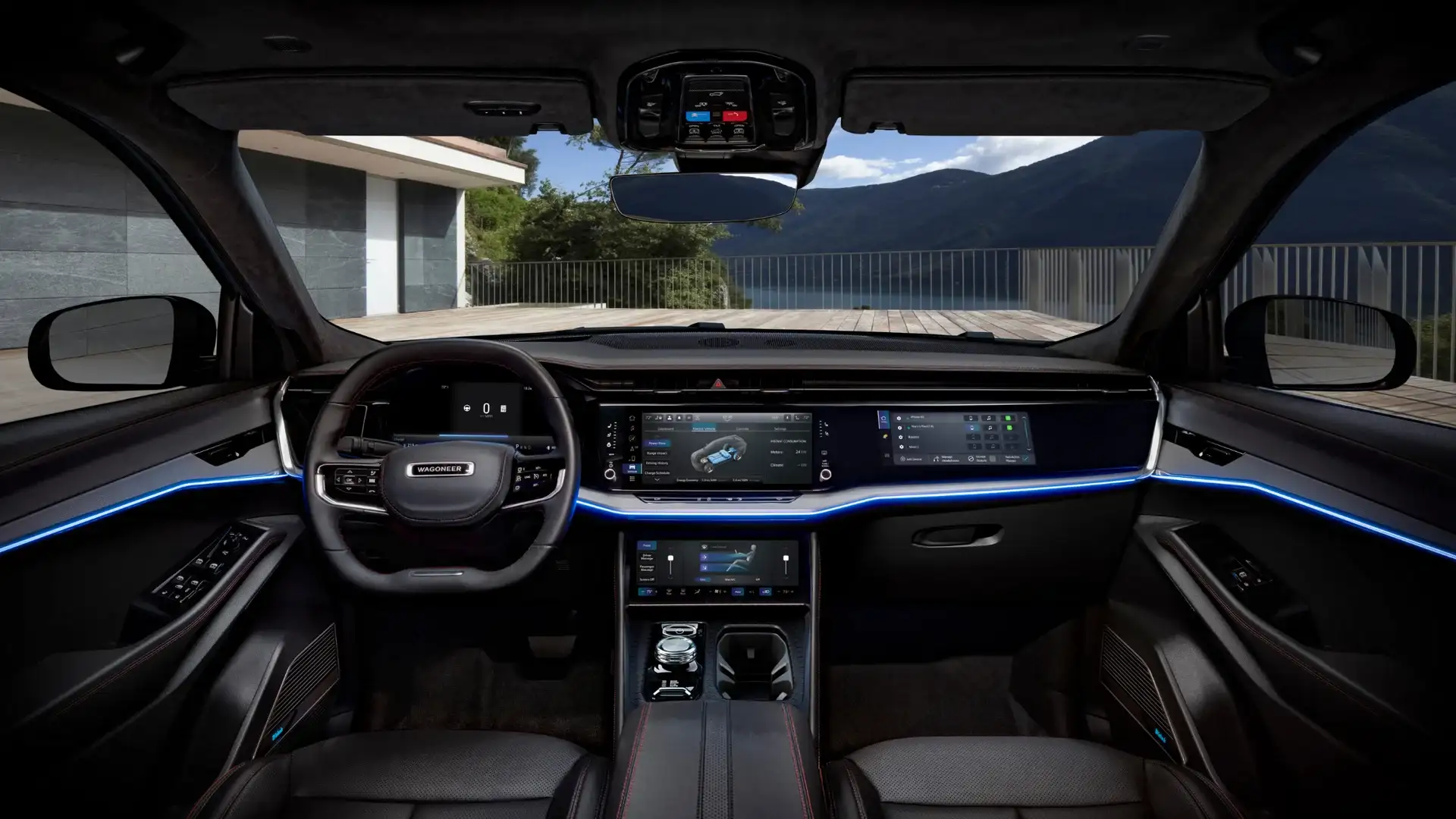 2025 Jeep Wagoneer S driving through city street with blurred background and modern urban setting.