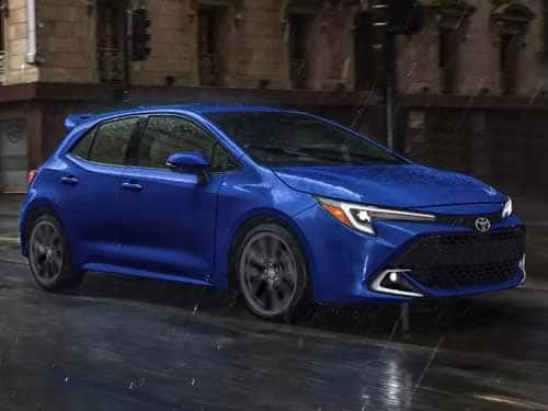 2025 Toyota Corolla Hatchback driving in the rain