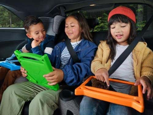 2025 Toyota Sienna view of kids in back seat on tablets