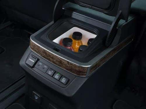 2025 Toyota Sienna close up view of fridgebox with drinks in it