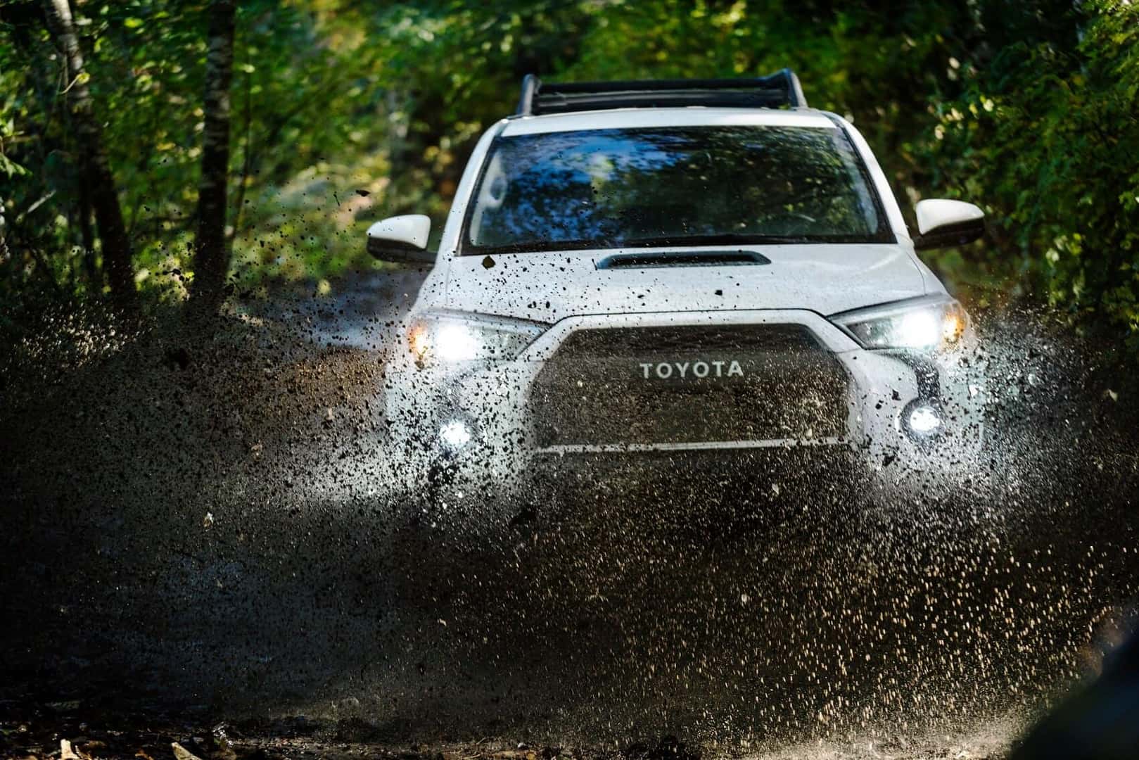 2022 Toyota 4Runner driving through the mud