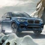 BMW X3 driving in snow