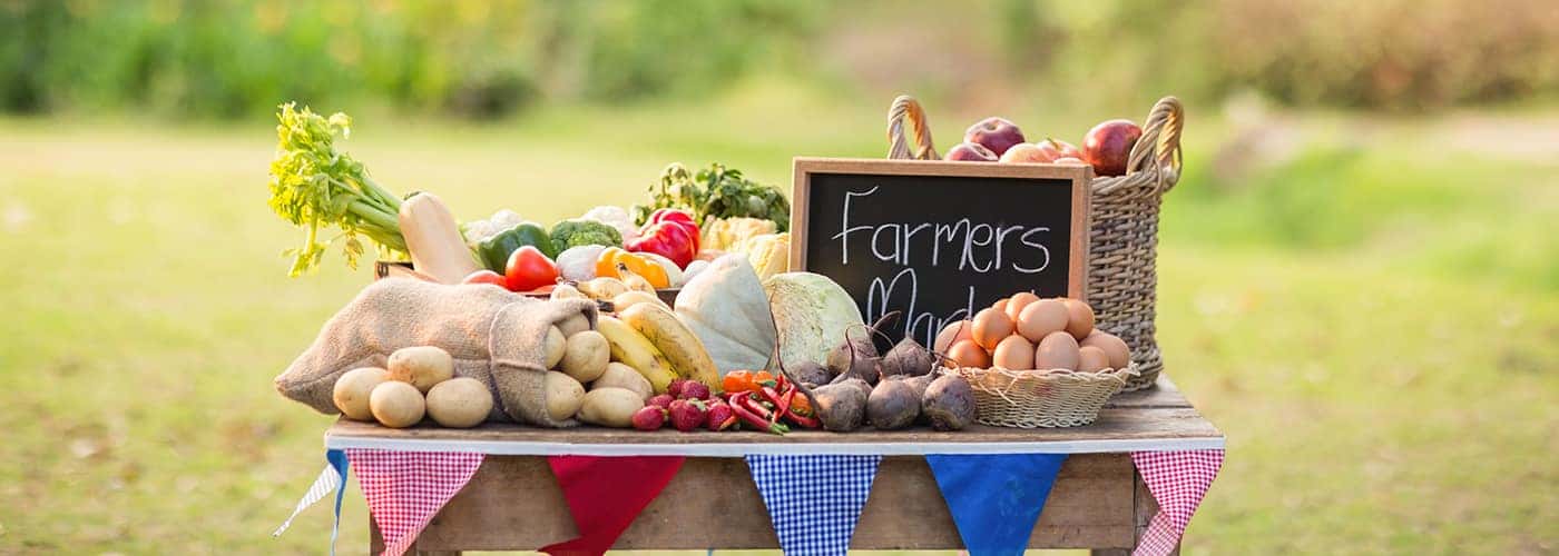 Table with locally grown vegetables in the park