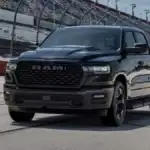 A black RAM 1500 on a race track
