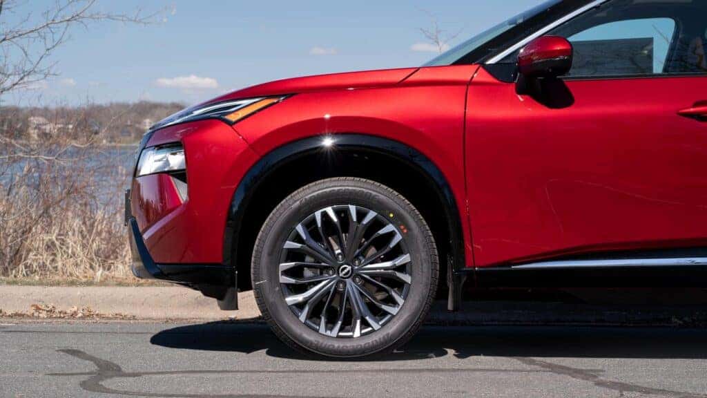 Front end of red 2024 nissan rogue