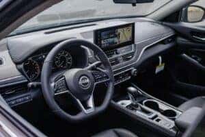 Steering wheel and infotainment area inside a 2024 Nissan Altima