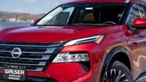 V-motion grille on a red 2024 Nissan Rogue