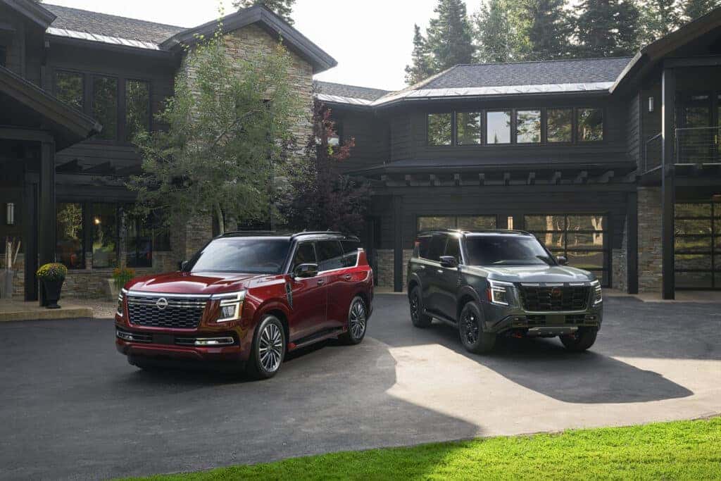 Two 2025 Nissan Armadas parked in front of a home