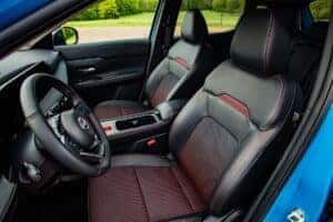 2024 Nissan Kicks Interior Front Seats with red stitching