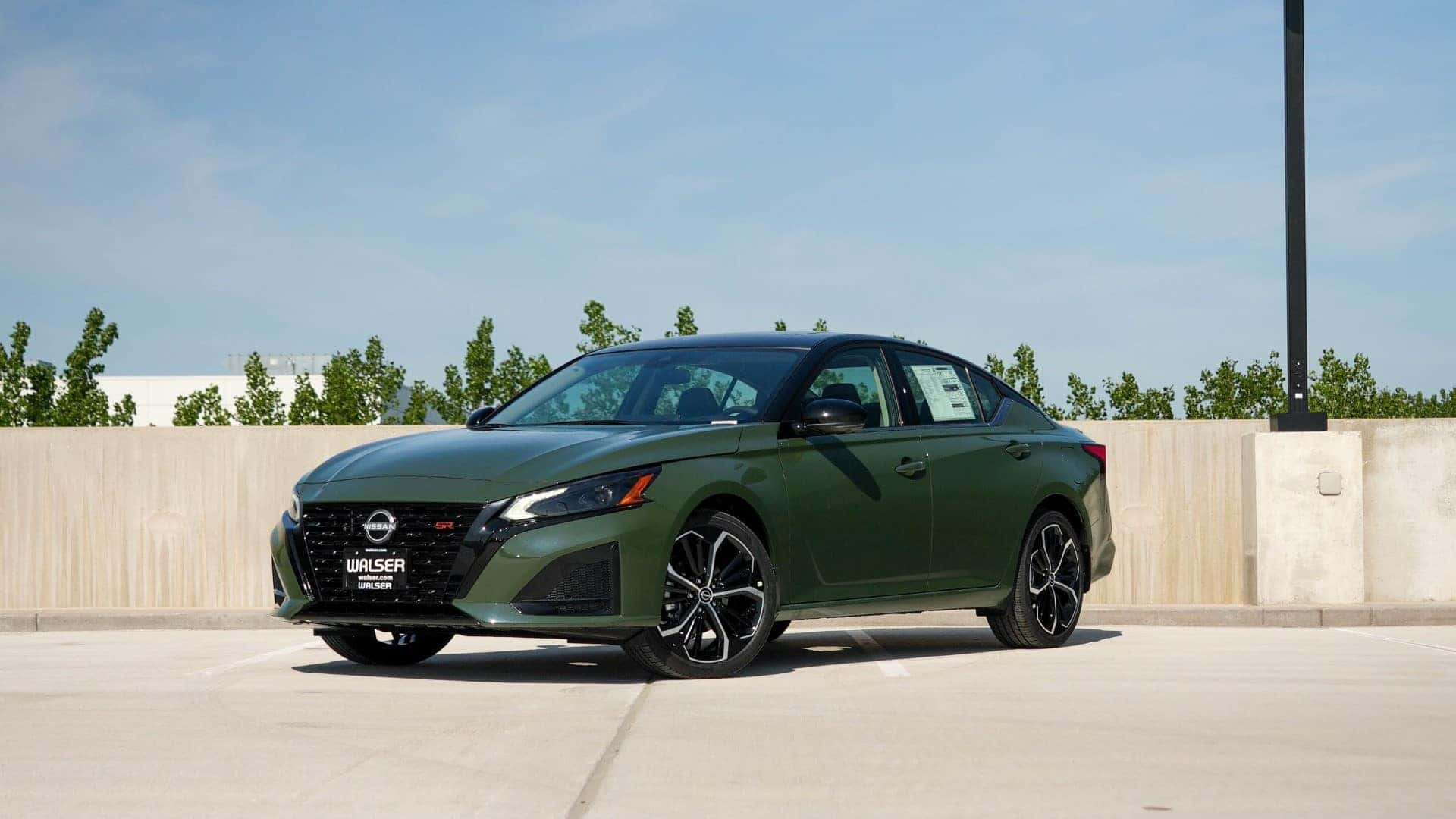 Green 2026 Nissan Altima parked.