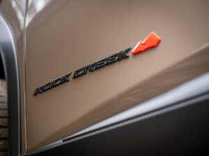 2025 Nissan Rogue Rock Creek black exterior badging